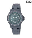 Q&Q Green With White Strap Watch