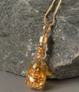 Ziveg Gold Flakes Filled Attar Bottle Shape Pendant